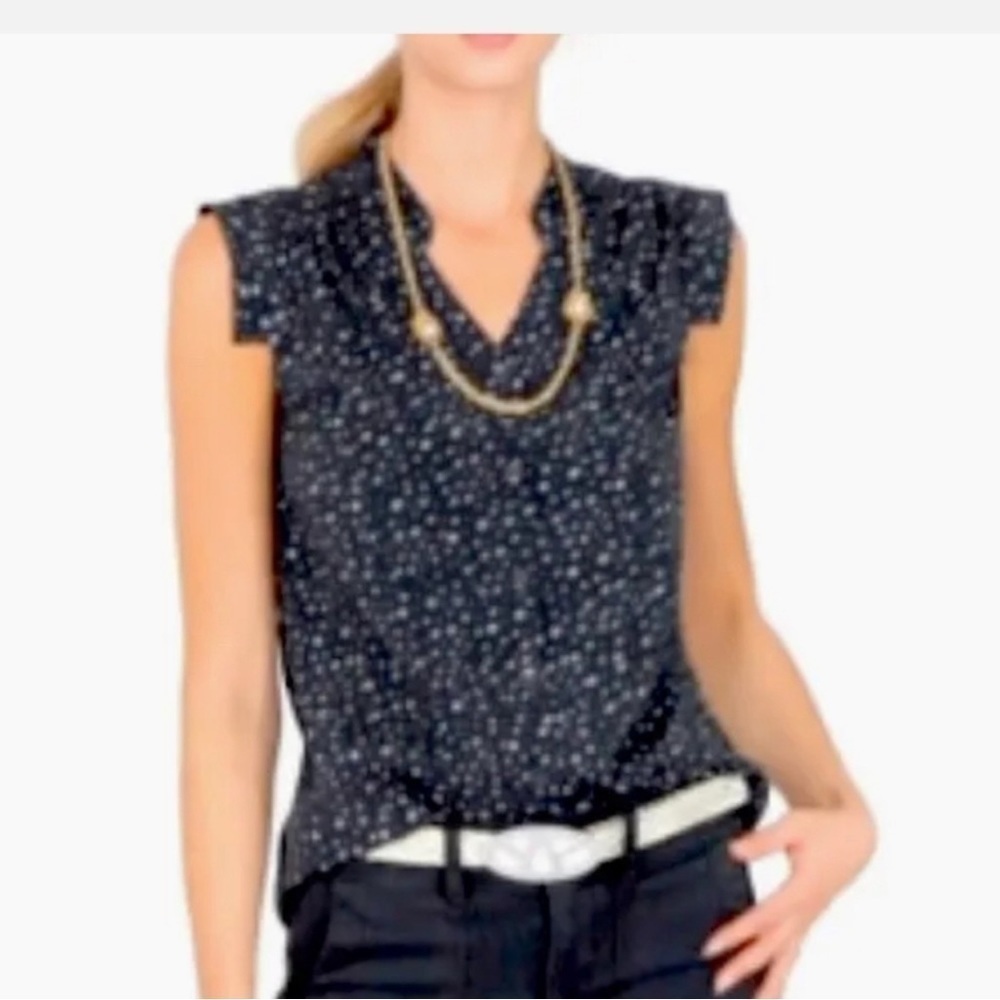 Cabi- White Star Print, Short Cap Sleeves, and a Size of Medium.